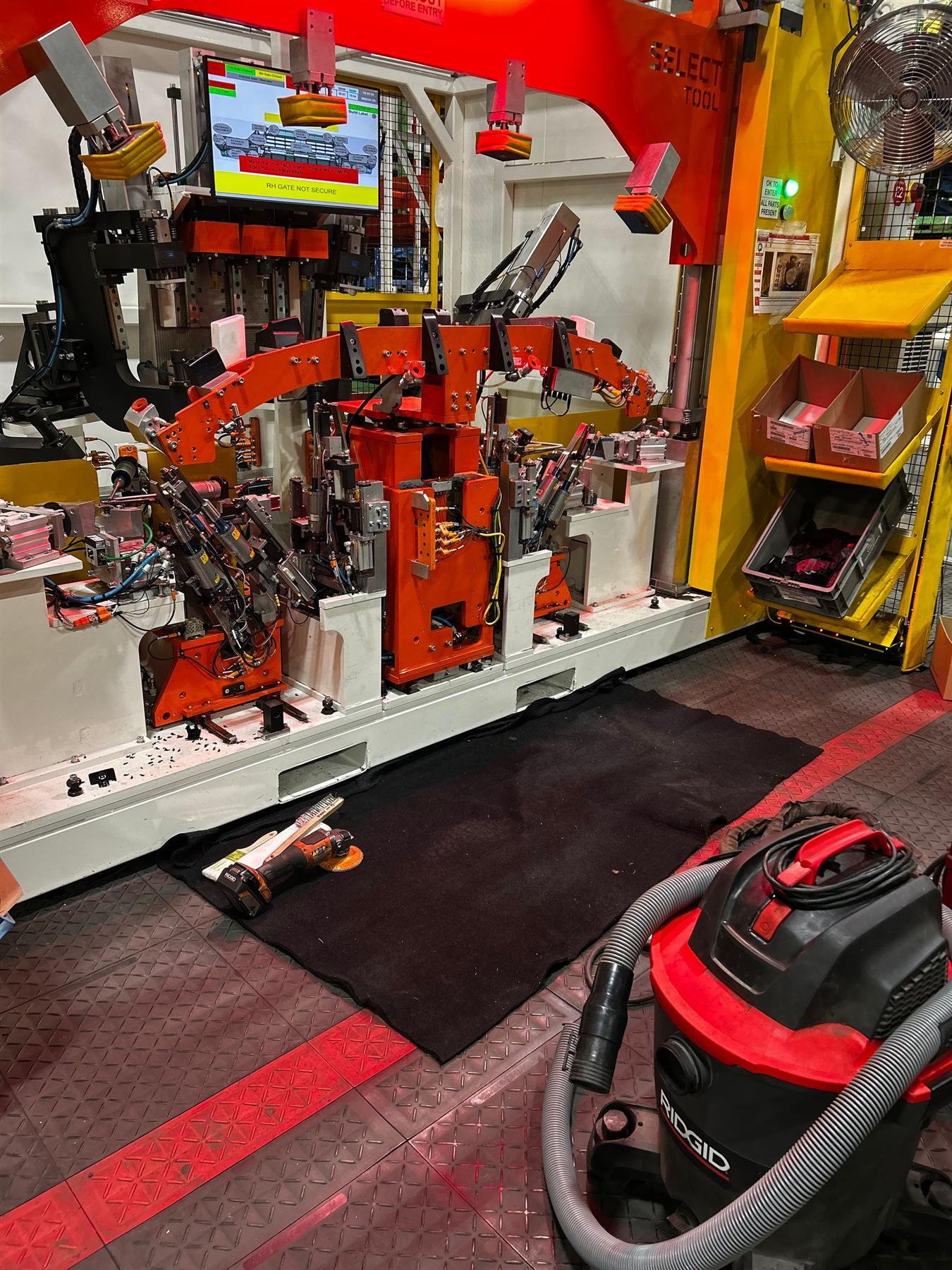 On-site welding work at an industrial assembly line in a manufacturing plant